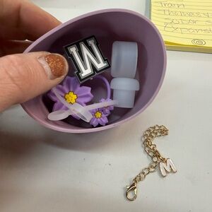 Purple Silicone Stanley accessories with straw covers and handle accessory